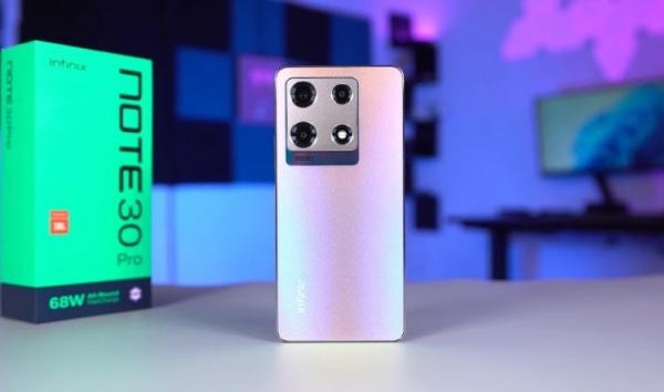 Infinix NOTE 30 Pro — смартфон с беспроводной зарядкой. Редкий смартфон до 20 тысяч с поддержкой беспроводной зарядки. Фото: Valor Reviews. Infinix NOTE 30 Pro — смартфон с беспроводной зарядкой. Редкий смартфон до 20 тысяч с поддержкой беспроводной зарядки. Фото: Valor Reviews. Фото.