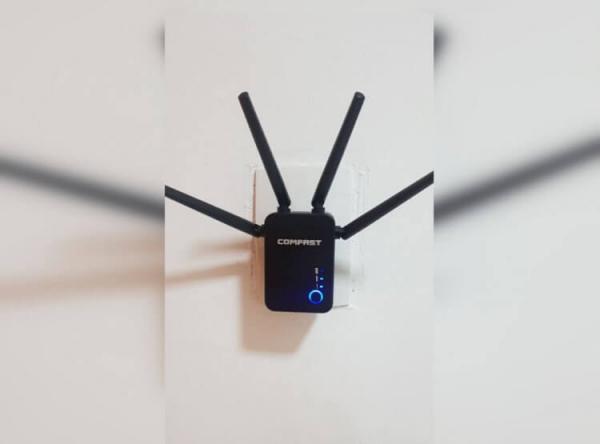 Репитер Wi-Fi для дома. Этот усилитель сигнала позволит избежать тормозов при использовании интернета. Фото.