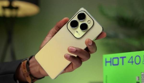 Почему смартфоны большие. Infinix HOT 40 Pro — смартфон для здоровяков и людей с тягой к гигантизму. Фото: Izzi Boye. Фото.